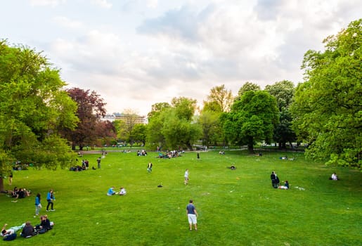 Vienna, Austria - April 22, 2009: people are relaxing in public city park in Vienna, Austria.