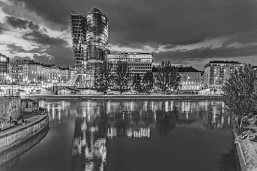 Vienna, Austria - April 22, 2009: facade of uniqua tower  in Vienna, Austria. The building received the European Union GreenBuilding label. It is illuminated by night.