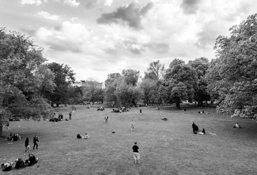 Vienna, Austria - April 22, 2009: people are relaxing in public city park in Vienna, Austria.