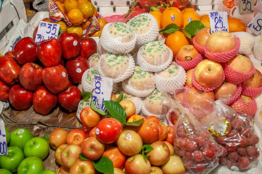Bangkok, Thailand- January 3, 2010: fresh fruits of any kind is offered at the flower market Pak klong Talat in chinatown, Bangkok.