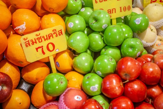 Bangkok, Thailand- January 3, 2010: fresh fruits of any kind is offered at the flower market Pak klong Talat in chinatown, Bangkok.