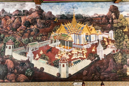 Bangkok, Thailand - January 4, 2010: mural painting at famous temple Phra Sri Ratana Chedi covered with foil gold in the inner Grand Palace.