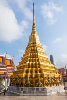 Bangkok, Thailand - January 4, 2010: famous temple Phra Sri Ratana Chedi covered with foil gold in the inner Grand Palace in Bangkok.