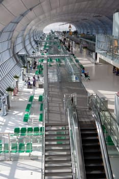 Bangkok, Thailand - January 5, 2010: passengers wait at the departure gate for the boarding call of their flight in the new Bangkok airport Suvarnabhumi.