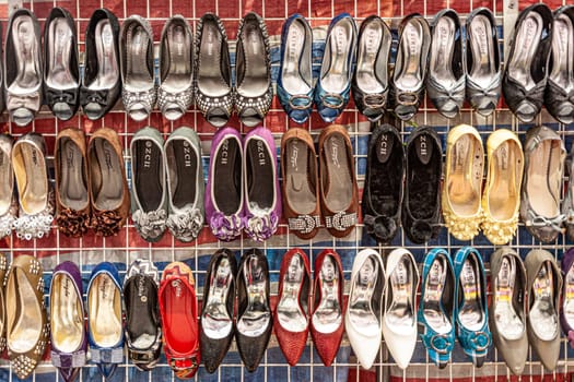 Hongkong, China - January 7, 2010: ladies shoes for sale at the night market in Hongkong.