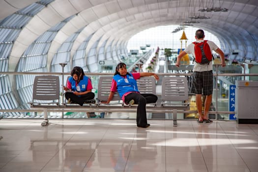 Bangkok, Thailand - January 5, 2010: cleaning personal has a rest at the new Bangkok airport Suvarnabhumi.