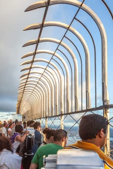 New York, USA - July 9, 2010: people enjoy the view to skyline of New York from empire state building.