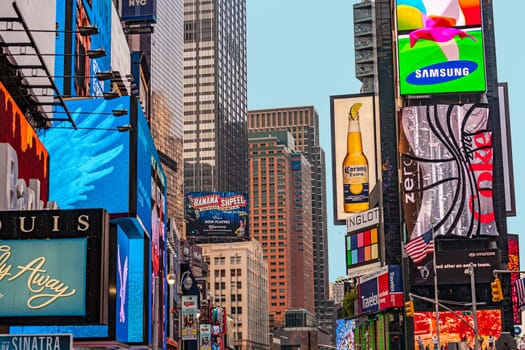 New York,USA - July 8, 2010: Times Square, featured with Broadway Theaters and huge number of LED signs, is a symbol of New York City and the United States, July 8, 2010 in Manhattan, New York City.