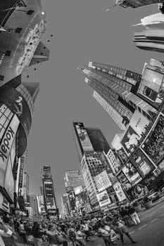 New York, USA - July 8, 2010: people enjoy the evening at  at Times Square  in New York City. It. is a symbol of New York City and the United States