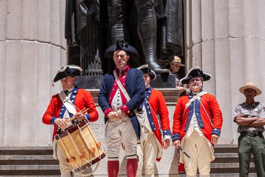 New York, USA - July 9, 2010: Ceremony for declaration of independence in old costumes takes place at the Washington statue in front of federal Hall National Memorial in New York, USA.