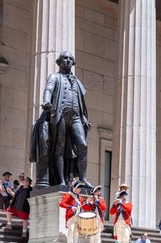 New York, USA - July 9, 2010: Ceremony for declaration of independence in old costumes takes place at the Washington statue in front of federal Hall National Memorial in New York, USA.