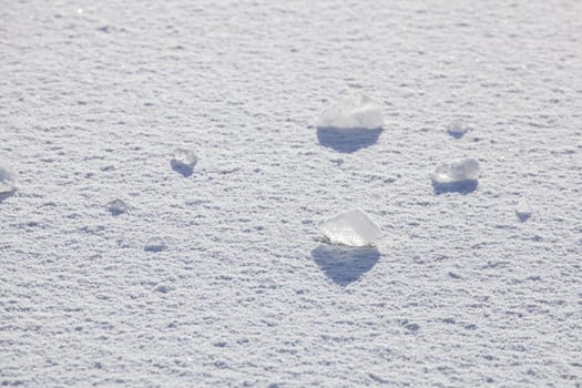 Snow-covered ice surface with pieces of ice, Germany