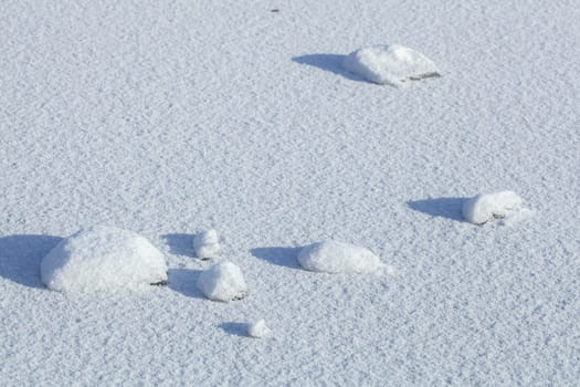 Snow-covered ice surface with pieces of ice, Germany