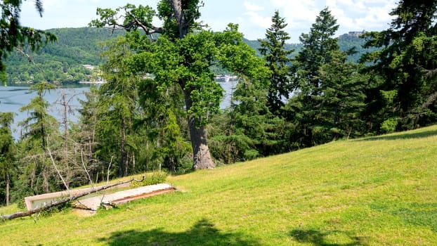 Landscape with a view of Lake Edersee with trees, blue sky and clouds, in Hesse, Germany