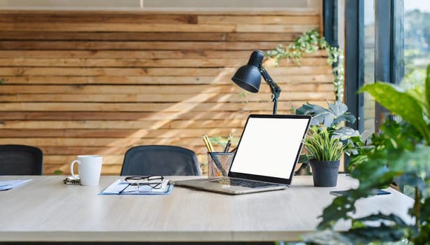 Modern office interior with blank wooden wall.