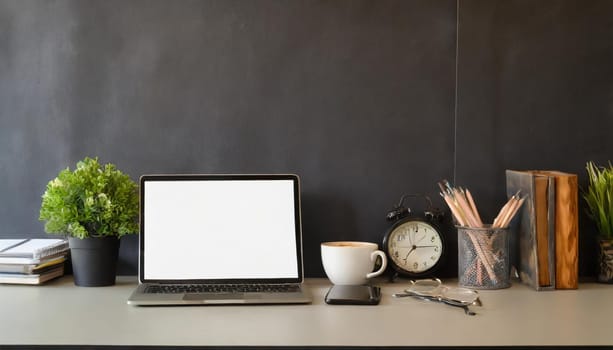 office table with copy space, stationery, vase, and lamp.