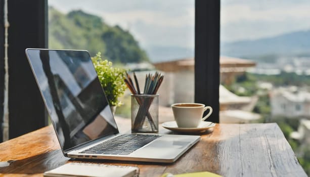 Modern workplace with laptop computer, coffee cup and office supplies