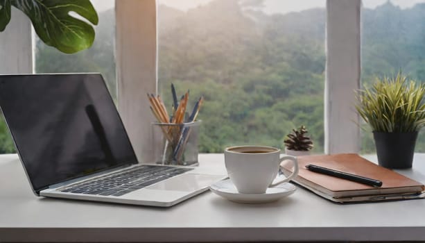 Modern workplace with laptop computer, coffee cup and office supplies