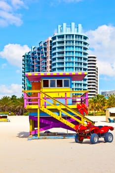 Miami, USA - July 27, 2010: wooden colorful beach watch hut at the beautiful white beach in the art deco district in Miami.
