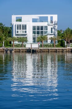 Miami Beach, USA - July 31, 2010: luxury houses at the canal in Miami Beach, USA. Pinetree Drive is the premier neighborhood for luxury homes.