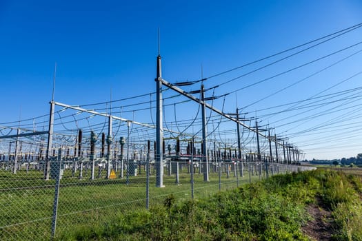 Hofheim, Germany - September 6, 2010: electrical power plant in beautiful colorful meadow