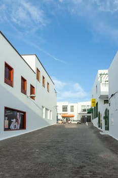 Playa Blanca, Spain - December 22, 2010: view to pedestrian zone in Playa Blanca in early morning without people.