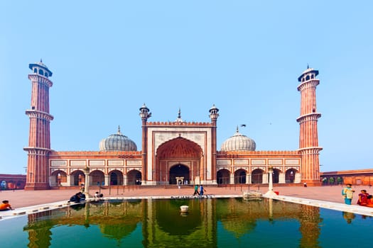 Delhi, India - November 9, 2011: Pilgrims in Mosque Jama Masjid on November 11,2011. It is the largest and best-known mosque in India.