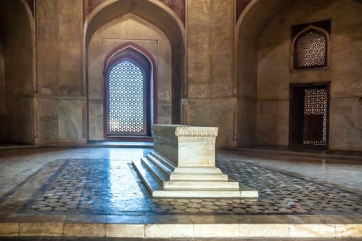 Delhi, India - November 11, 2011: beautiful floor with marble coffin  and ornaments in islamic style inside humayuns tomb in Delhi, India. Humayun's tomb is the tomb of the Mughal Emperor Humayun.