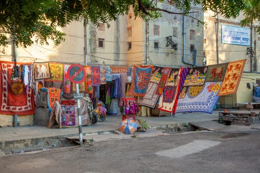 Jaipur, India - November 12, 2011: colorful clothes are sold at the street in Jaipur, India.