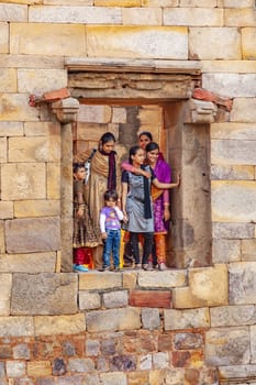Delhi, India - November 13, 2011:people visit Qutb Minar, Delhi, the worlds tallest brick built minaret