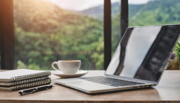 Modern workplace with laptop computer, coffee cup and office supplies