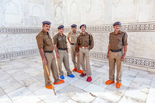 Agra, India - November 16, 2011: policemen in Uniform responsible for the safety at the Taj Mahal in Agra.