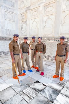 Agra, India - November 16, 2011: policemen in Uniform responsible for the safety at the Taj Mahal in Agra.