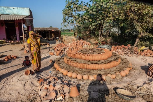 Fathepur Sikri, India - November 16, 2011: small pottery producing red ware in a small village near Fatehpur Sikri.
