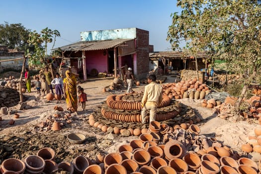Fathepur Sikri, India - November 16, 2011: small pottery producing red ware in a small village near Fatehpur Sikri.