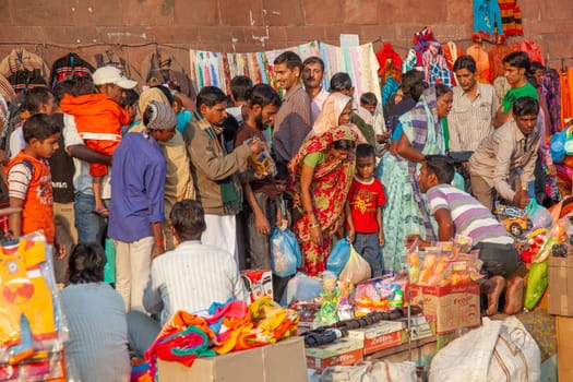 New Delhi, India - November 17, 2011: people at Meena Bazaar in Chandni Chowk area selling goods at the old open air market in India.