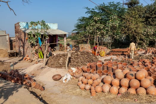Fathepur Sikri, India - November 16, 2011: small pottery producing red ware in a small village near Fatehpur Sikri.