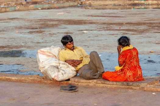 Delhi, India - November 17, 2011: poor homeless fpeople rest at the Meena Bazaar in area Chandni Chowk in New Delhi, India.