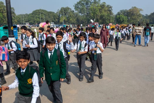 New Delhi, India - November 17, 2011: children at india gate in school uniform have an excursion organized by the school to visit india gate.