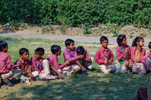 New Delhi, India - November 17, 2011: children at india gate in school uniform have an excursion organized by the school to visit india gate.