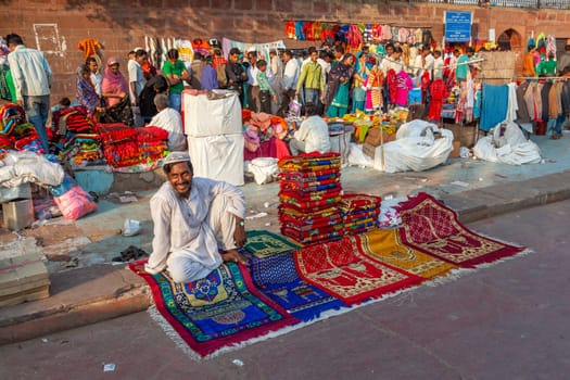 New Delhi, India - November 17, 2011: people at Meena Bazaar in Chandni Chowk area selling goods at the old open air market in India.