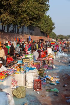 New Delhi, India - November 17, 2011: people at Meena Bazaar in Chandni Chowk area selling goods at the old open air market in India.