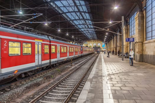 Wiesbaden, Germany - December 23, 2011: passenger waiting for train in afternoon at Wiesbaden train station.