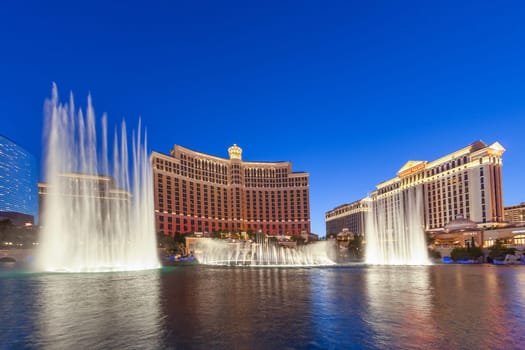 Las Vegas, USA - June 15, 2012: Las Vegas Bellagio Hotel Casino, featured with its world famous fountain show, at night with fountains in Las Vegas, Nevada.