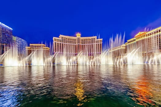 Las Vegas, USA - June 15, 2012: Las Vegas Bellagio Hotel Casino, featured with its world famous fountain show, at night with fountains in Las Vegas, Nevada.