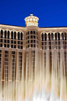 LAS VEGAS, USA - JUNE 15, 2012: Las Vegas Bellagio Hotel Casino, featured with its world famous fountain show, at night with fountains in Las Vegas, Nevada.