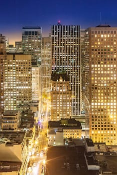 San Francisco, USA - June 20, 2012: aerial of San Francisco by night with facade of skyscraper.