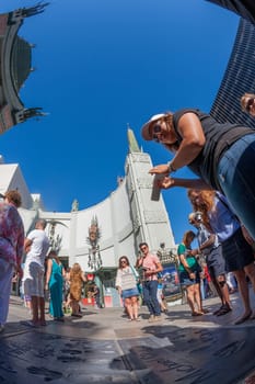 Los Angeles, USA - June 26, 2012: handprints of stars in Hollywood in the concrete of Chinese Theatre's forecourts.  There are nearly 200 celebrity handprints in the concrete of Chinese Theatre's forecourt.