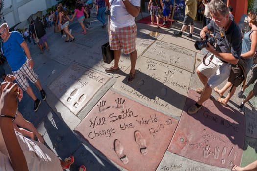 Los Angeles, USA - June 24, 2012: handprints of Will Smith in Hollywood in the concrete of Chinese Theatre's forecourts.  There are nearly 200 celebrity handprints in the concrete at the forecourt.