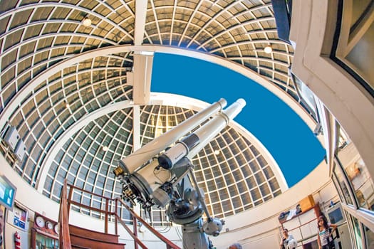 Los Angeles, USA - June 24, 2012: famous Zeiss telescope at the Griffith observatory in Los Angeles, USA.  The Zeiss Refractors of the observatory from 1935 is open to public and free due to Griffiths will.